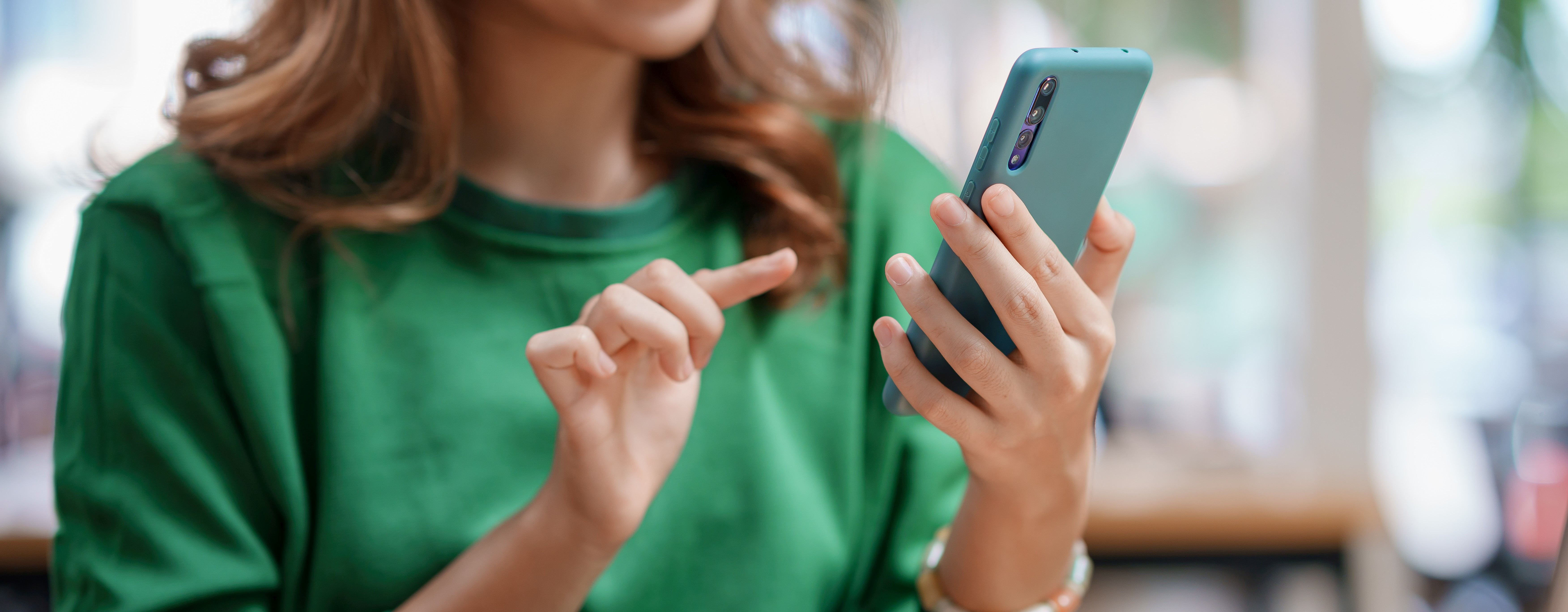 Image of a woman using a mobile device