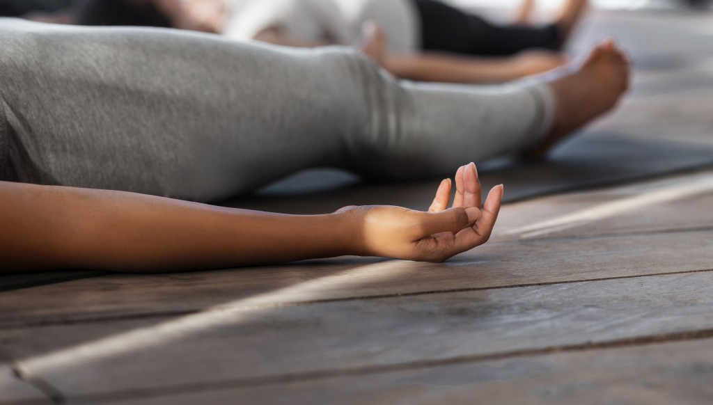 Woman Lying Down Meditating